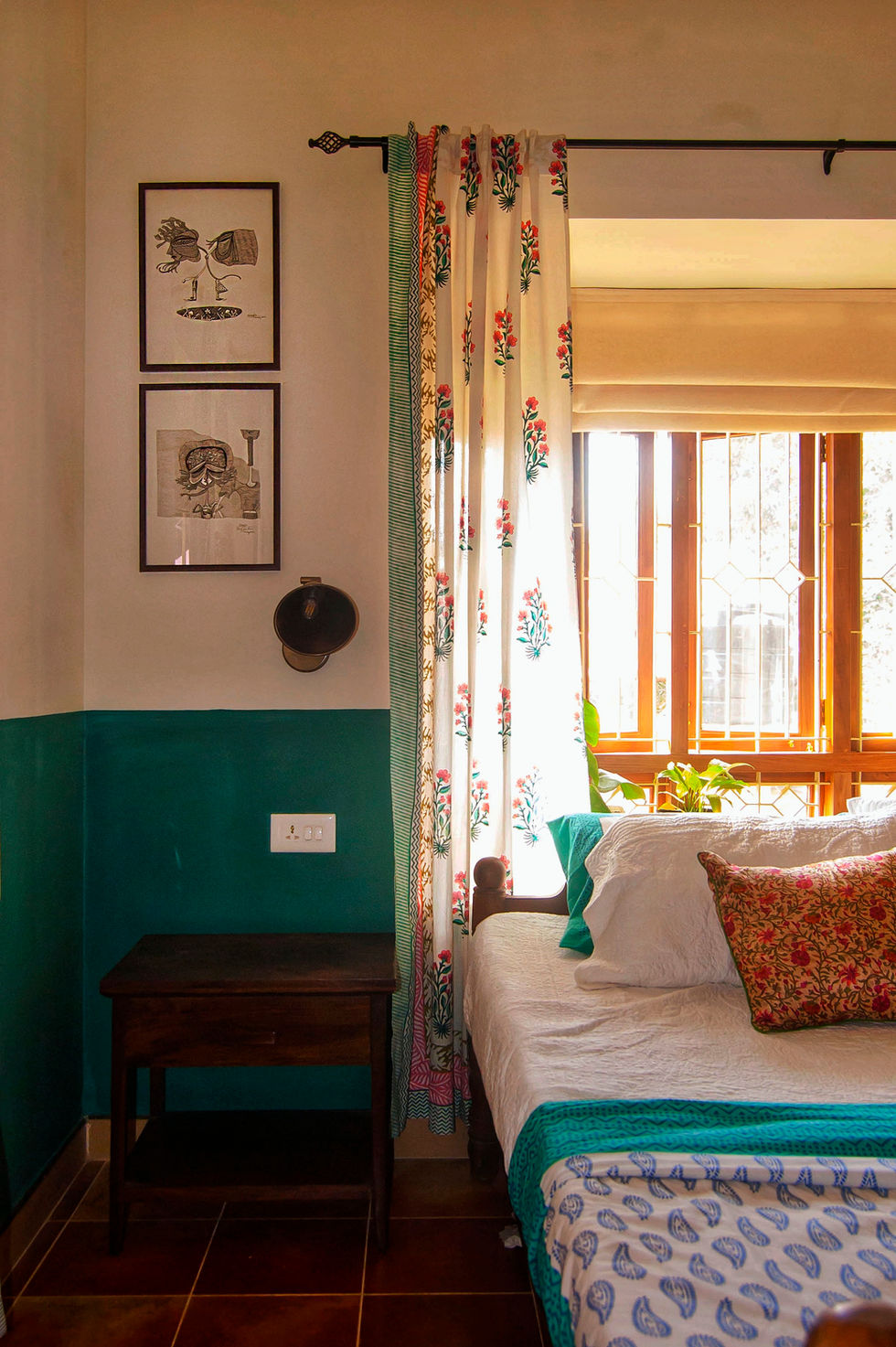 a bedroom with a bed a nightstand and a window