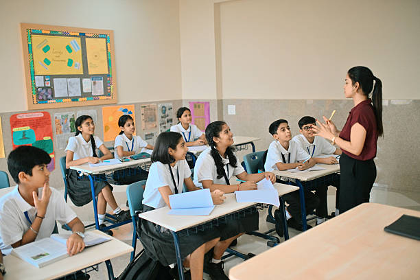 Teenage student sitting in a classroom during a school lesson