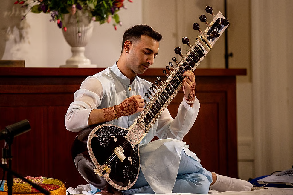 Rishab Rikhiram Sharma performing sitar for the Sitar for Mental Health initiative.