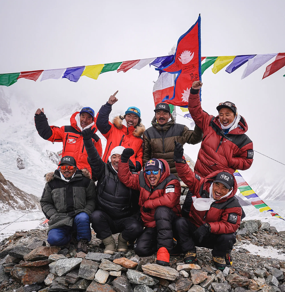 Nimsdai Purja and Nepali climbers celebrating historic K2 winter summit ascent