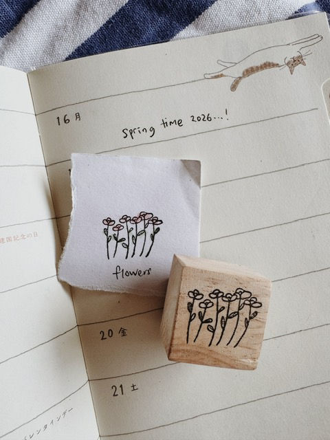 Thumbnail: Illustration of floweres on a rubber stamp