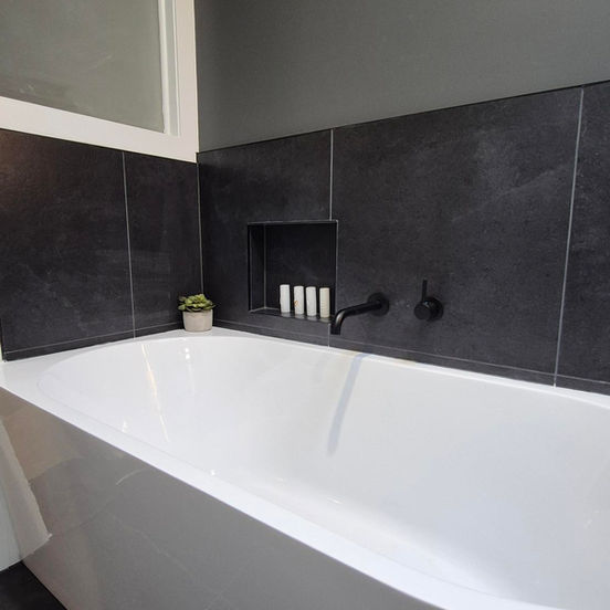 Back to wall corner bath