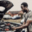 black man fixing a car.jpg
