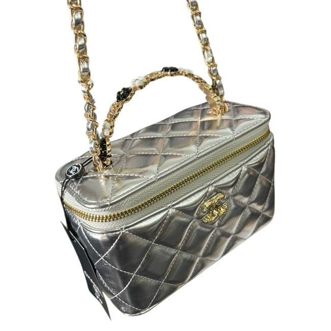 Thumbnail: VIP Silver Quilted Floral Handle Vanity Bag