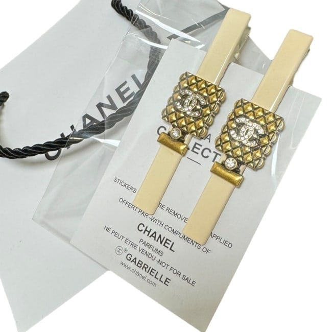 Thumbnail: CHANEL Cream/Gold Quilted Rhinestone CC Perfume Hair Clips