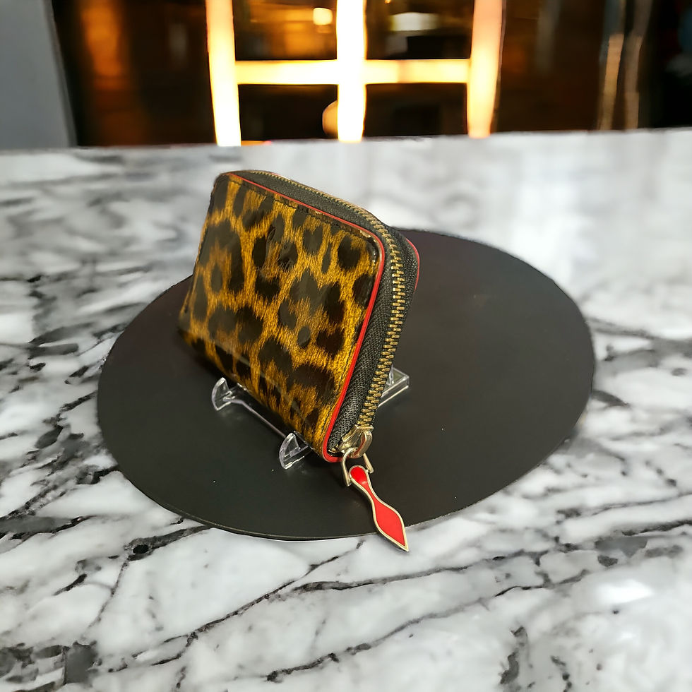 Thumbnail: Christian Louboutin Leopard Spike Sparán