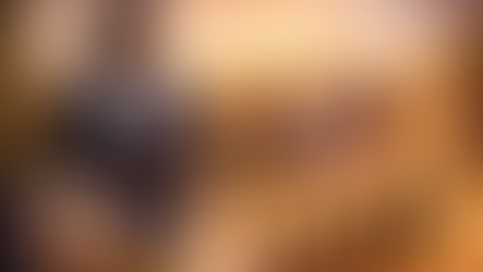 Smiling woman with clipboard in front of notary office, city skyline. Group at table reviewing papers. Gold coins and upward arrow symbolize growth.