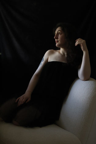 a drametic portrait of a woman with a classic look