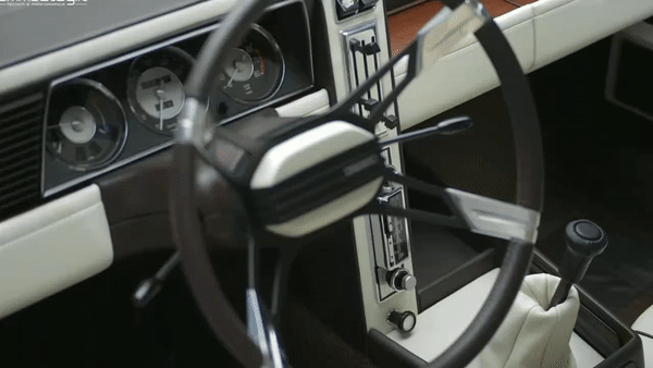 BMW Garmisch design stands on its rather unusual vertical radio on the center console, a lavish fold-out mirror for the passenger, and a flamboyant mix of colors and materials, the BMW Garmisch added an elegant Piemontese twist to the rather functional interior design habits of the time.