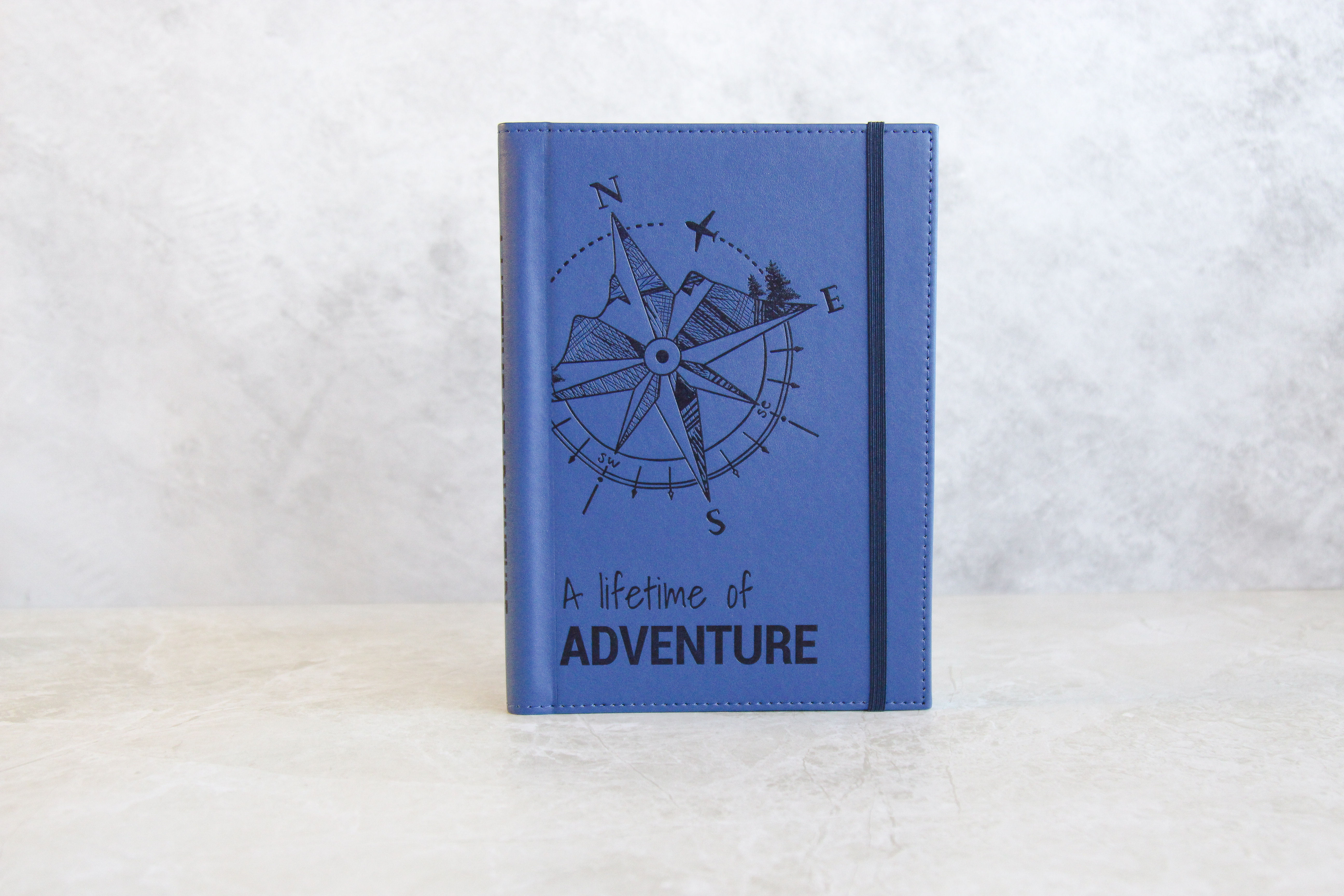 Worldwide Travel journal with title 'A Lifetime of Adventure' debossed in the front cover