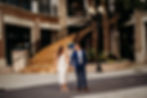engaged couple holding hands in downtown orlando