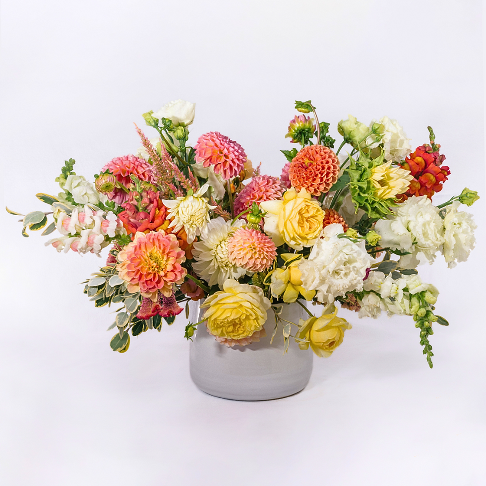 Thumbnail: Locally grown flowers arranged in a ceramic vase for delivery on Maui.