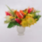 Locally grown flowers arranged in a ceramic vase for delivery on Maui.