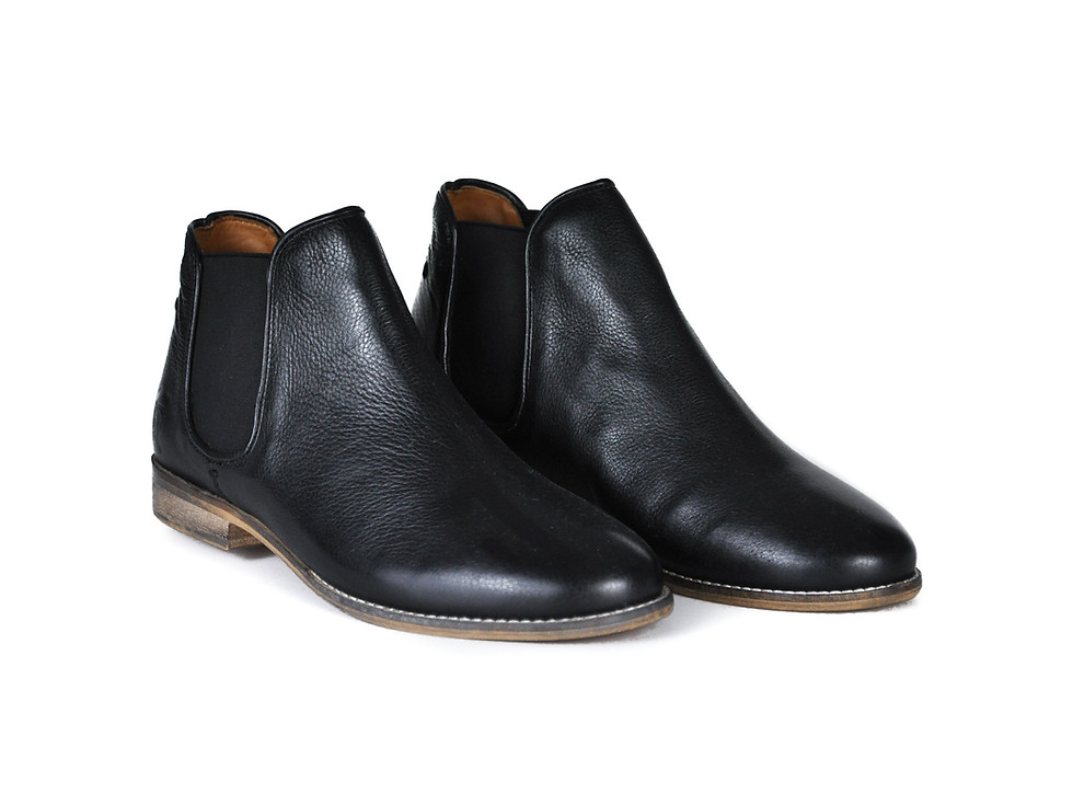 Pair of black leather boots on white background. My Site 1