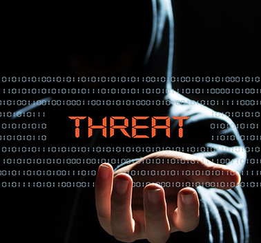 Man holding hand out with word threat over - CBRN chemical biological radioactive nuclear threat security and safety services