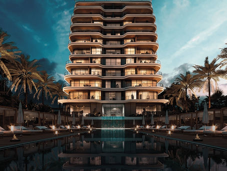 Modern high-rise hotel with glowing windows at dusk. Palm trees and empty lounge chairs surround a reflective pool, creating a serene ambiance.