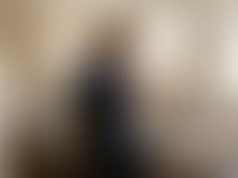 Woman reviews refurbishment checklist in London home