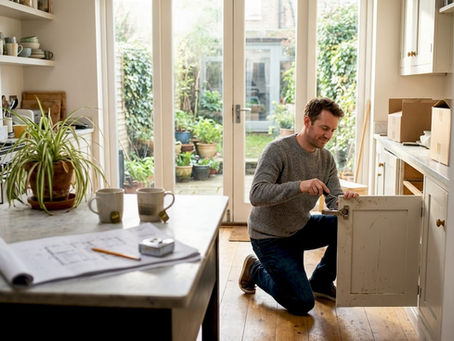 Homeowner working on kitchen extension in West London