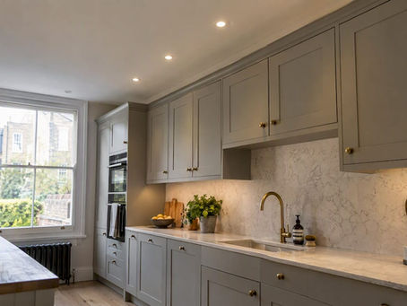 Kitchen downlights positioned beside wall cabinets