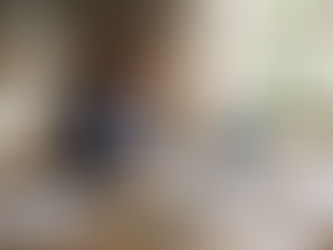 Homeowner planning refurbishment at dining table