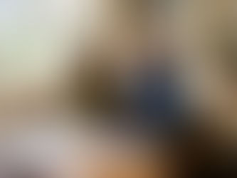 Couple reviewing modernisation plans in London living room