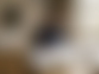 Homeowner reviewing house plans at kitchen table