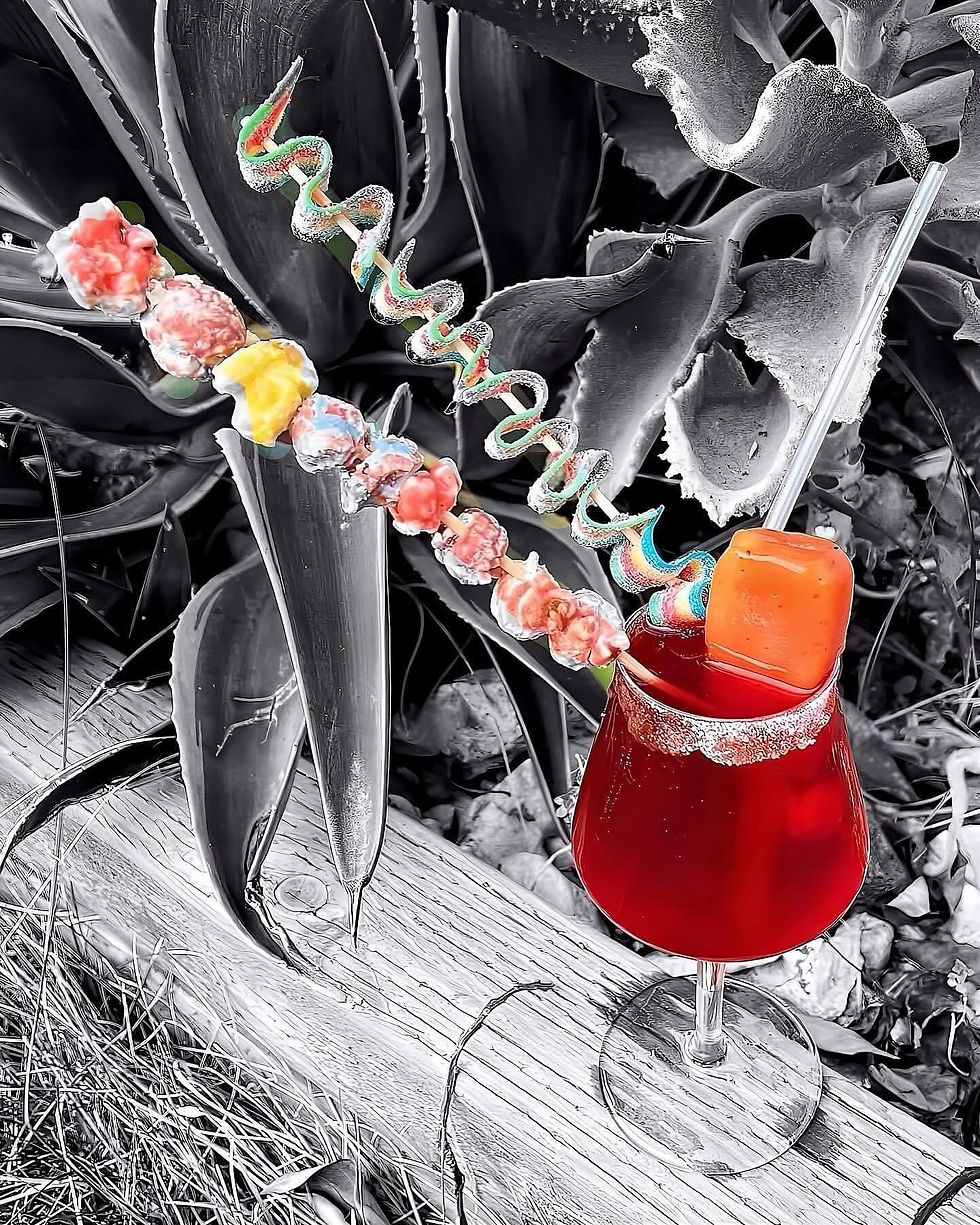 Craft Beverage Garnished With Popcorn, Candies And Popsicle