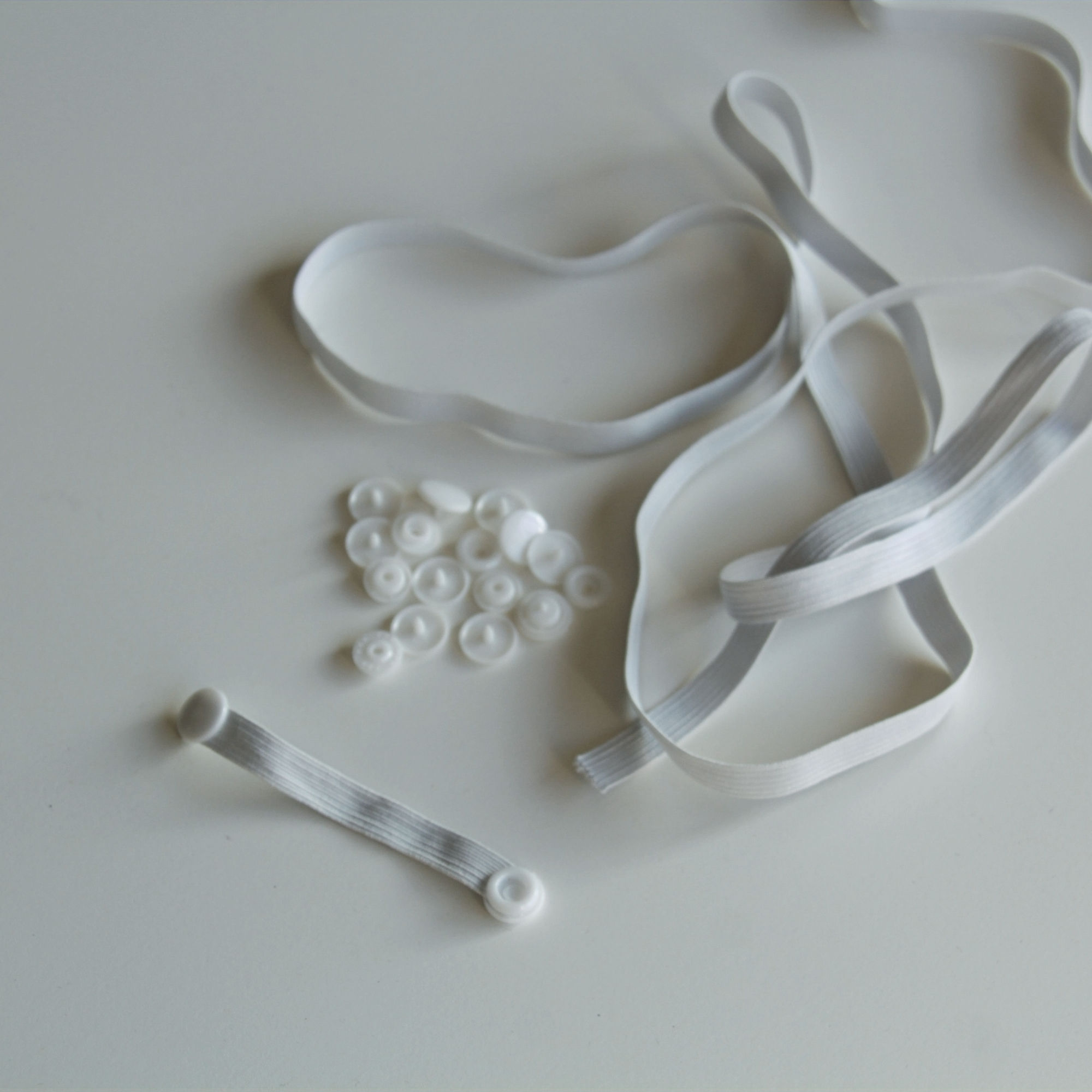 White custom elastic strap with plastic snaps for pet bow ties