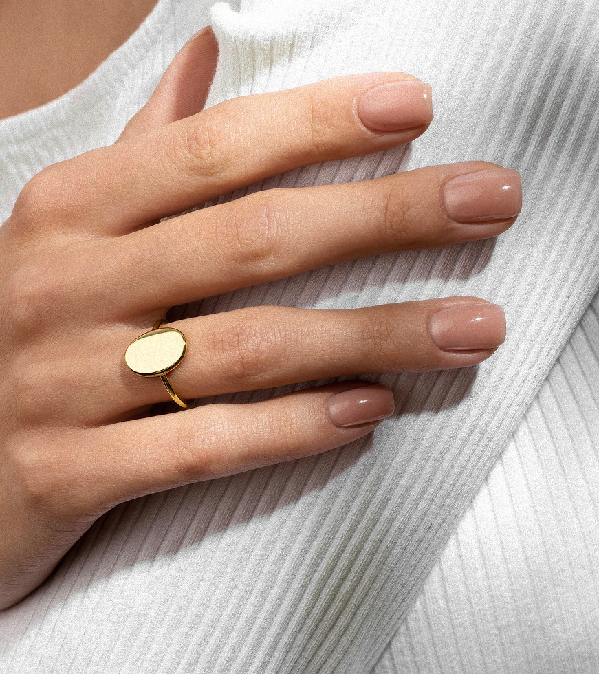 Gold Oval Ring on Hand_edited_edited.jpg