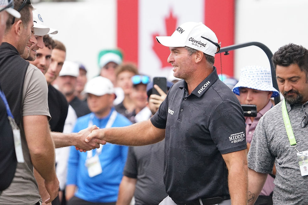 CALEDON, ON - June 8 - Ryan Fox celebrating with members of the New Zealand men's soccer team after his winning putt on the 18th hole at TPC Toronto at Osprey Valley. (Photo by Logan Brown)