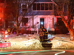 House Fire Displaces Two, Cat Rescued by Utica Firefighters