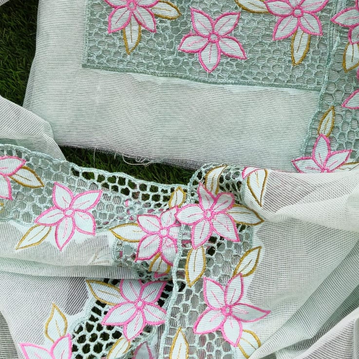 Thumbnail: Kota cutwork dress material in a soothing pista green shade