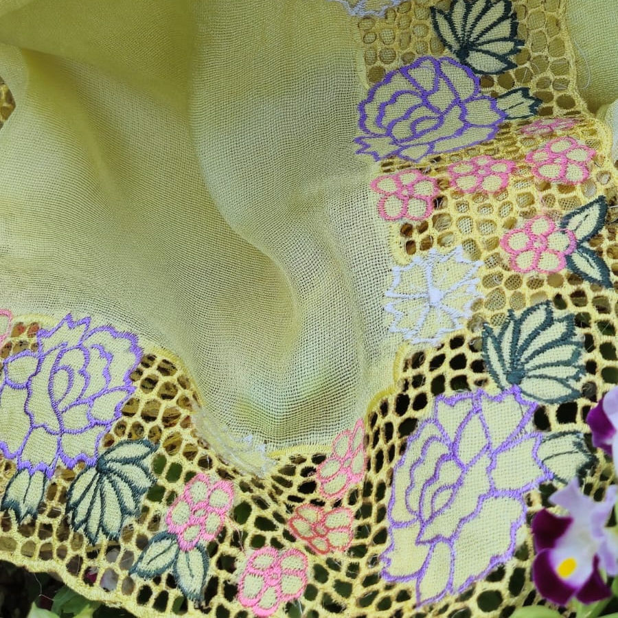 Lavender and pink flowers on Light yellow flowy saree