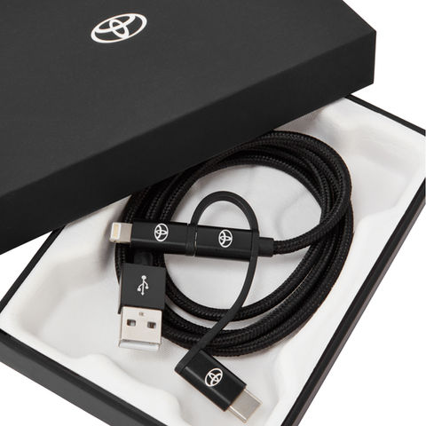 Black Toyota phone charger with white logo detail in branded box