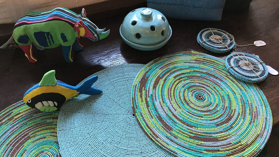 Recycled plastic flipflop animals and intricately beaded place mats