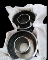 High pressure seal rings with housing