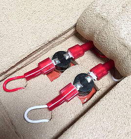 Dual thermostats embedded in foam insulation for silicone rubber heater