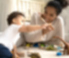 baby sitter playing with a baby