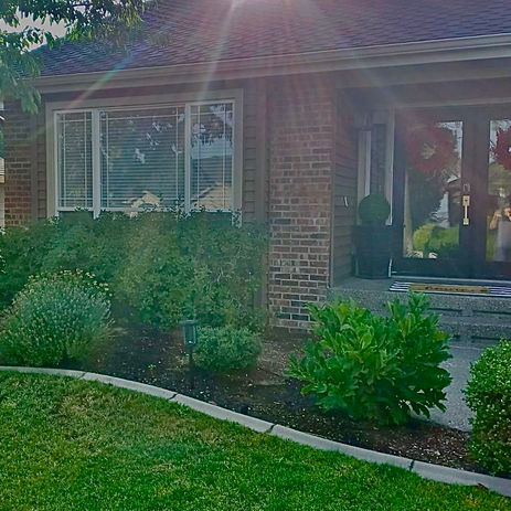 Front entrance with old brick finish.
