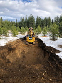 mine road base material, strip and pack topsoil