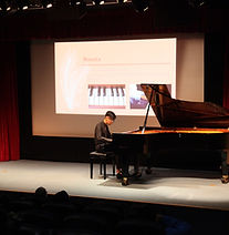 Piano student performing at a student recital