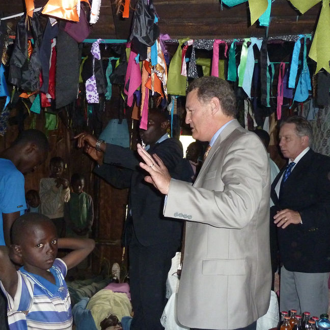 tom Ministering with people on floor.JPG.jpg