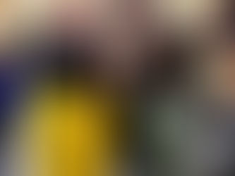 Photographie des participants réunis pour converser dans une grande salle.