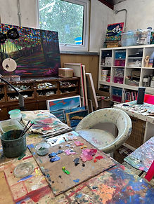 artists studio seat and paints