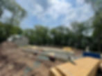 Eye-level view of a construction site with foundation work in progress