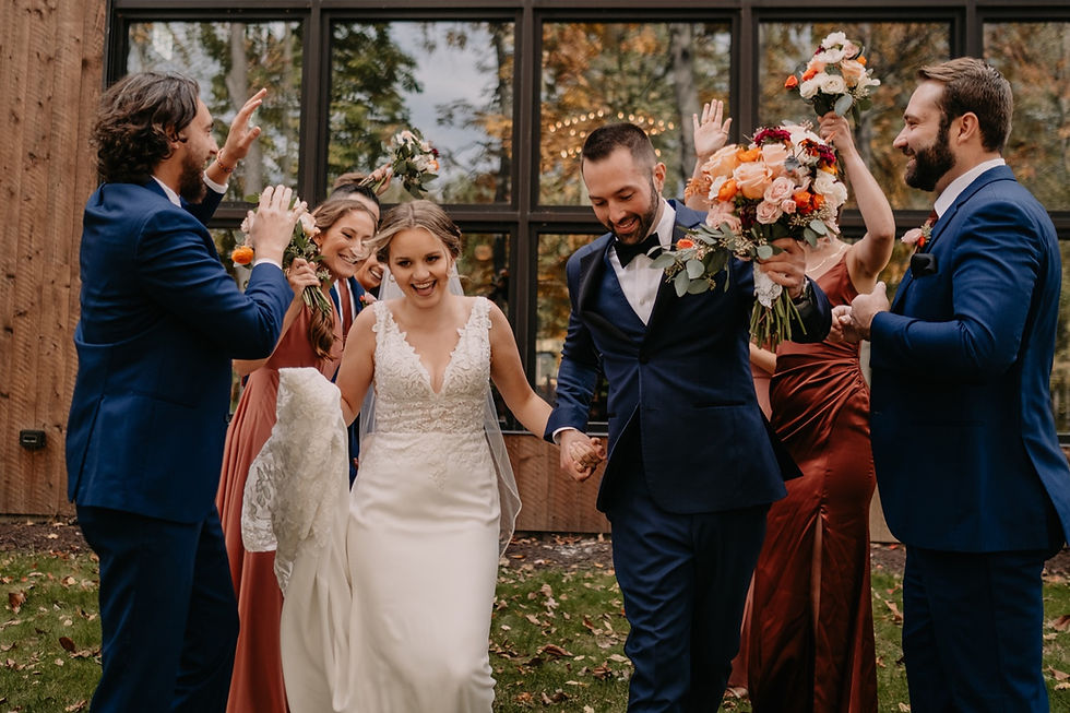 Bride and groom with wedding party. Michigan wedding photography by Nicole Leanne Photography