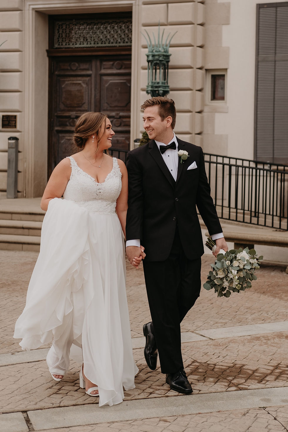 Lifestyle wedding photography at The War Memorial in Grosse Pointe Michigan. Photographed by Nicole Leanne Photography.