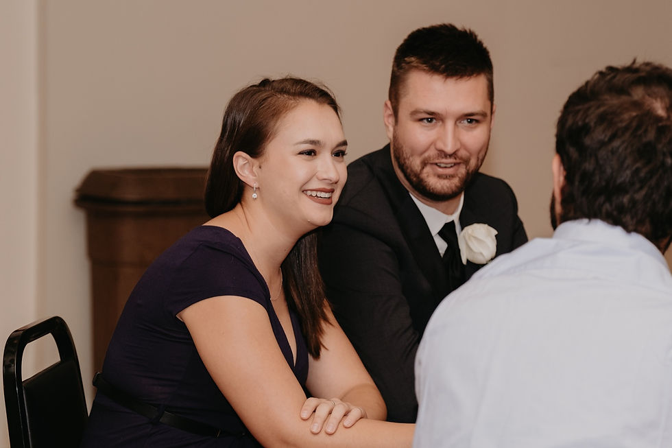 Wedding reception candids of guests mingling.