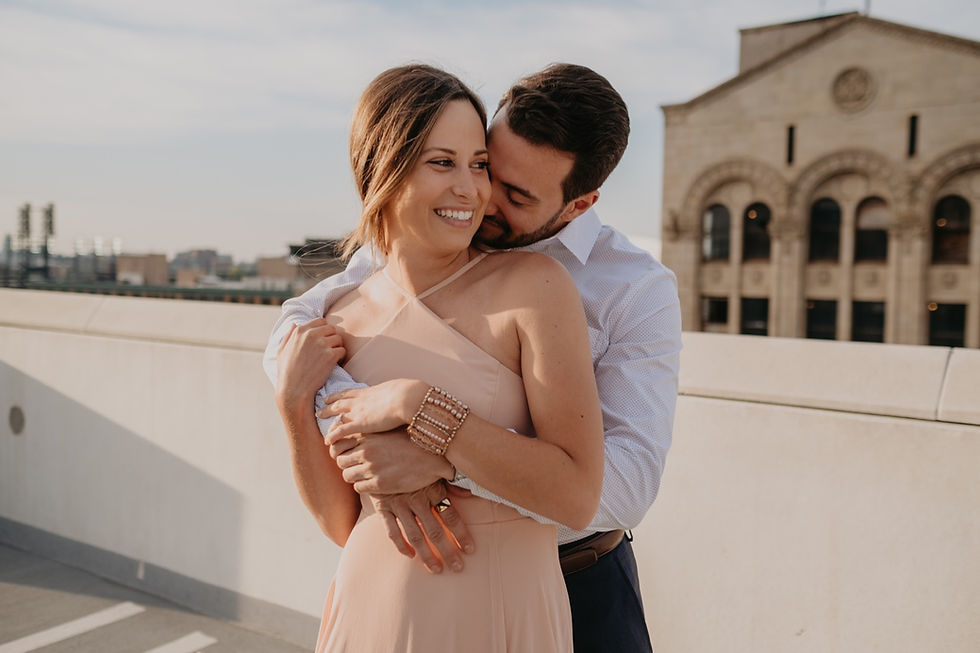 Detroit rooftop engagement photos. Photographed by Nicole Leanne Photography.