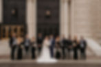 Bride and groom with wedding party on the step of the DIA in Detroit. Detroit wedding photography by Nicole Leanne Photography